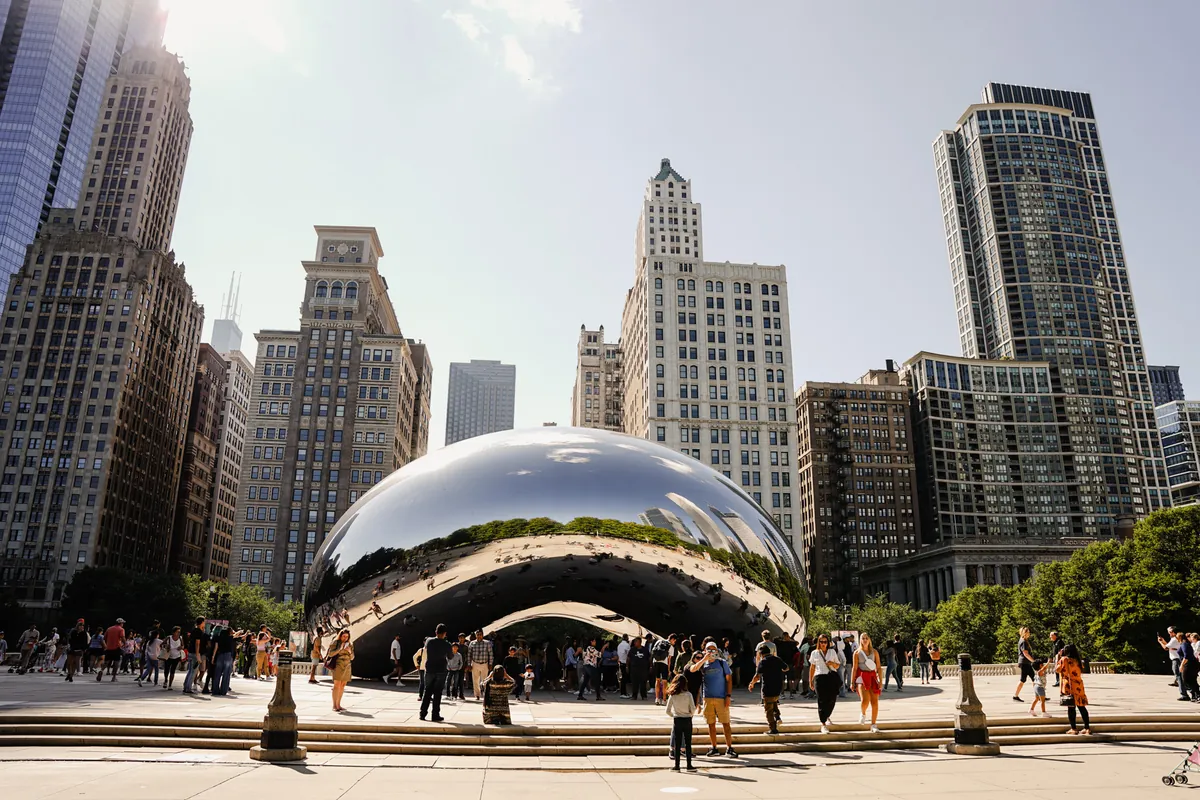 Cloud Gate sculpture reflecting the Chicago skyline